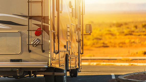 A motorhome travelling in the dessert heat