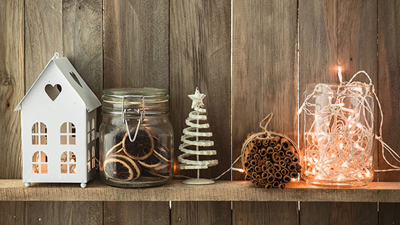 A happy family decorating a tree